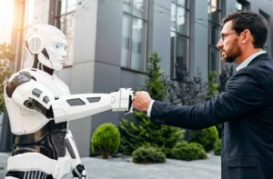 Ki ersetzt jobs: Mensch erhebt die faust gegen eine Roboter-faust – Symbolbild dafür, dass die künstliche intelligenz in konkurrenz mit angestellten steht